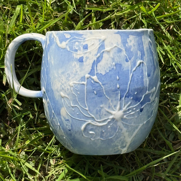 Blue porcelain mug (slip trailed)
