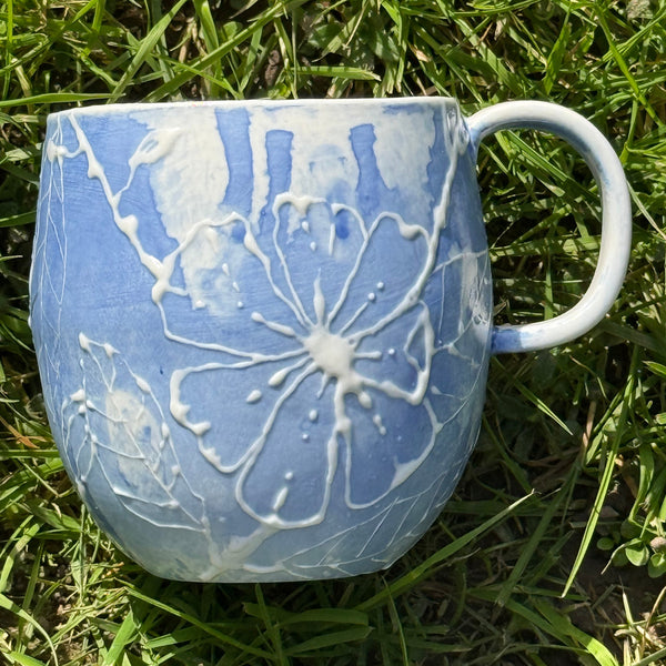 Blue porcelain mug (slip trailed)