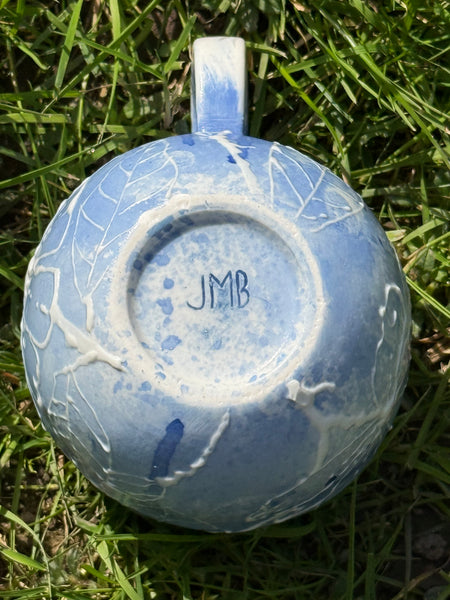 Blue porcelain mug (slip trailed)