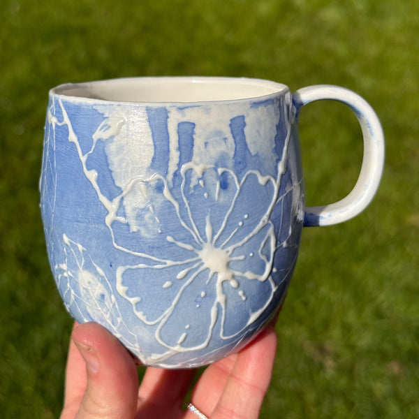 Blue porcelain mug (slip trailed)
