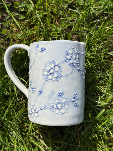 Blue porcelain jug (slip trailed)